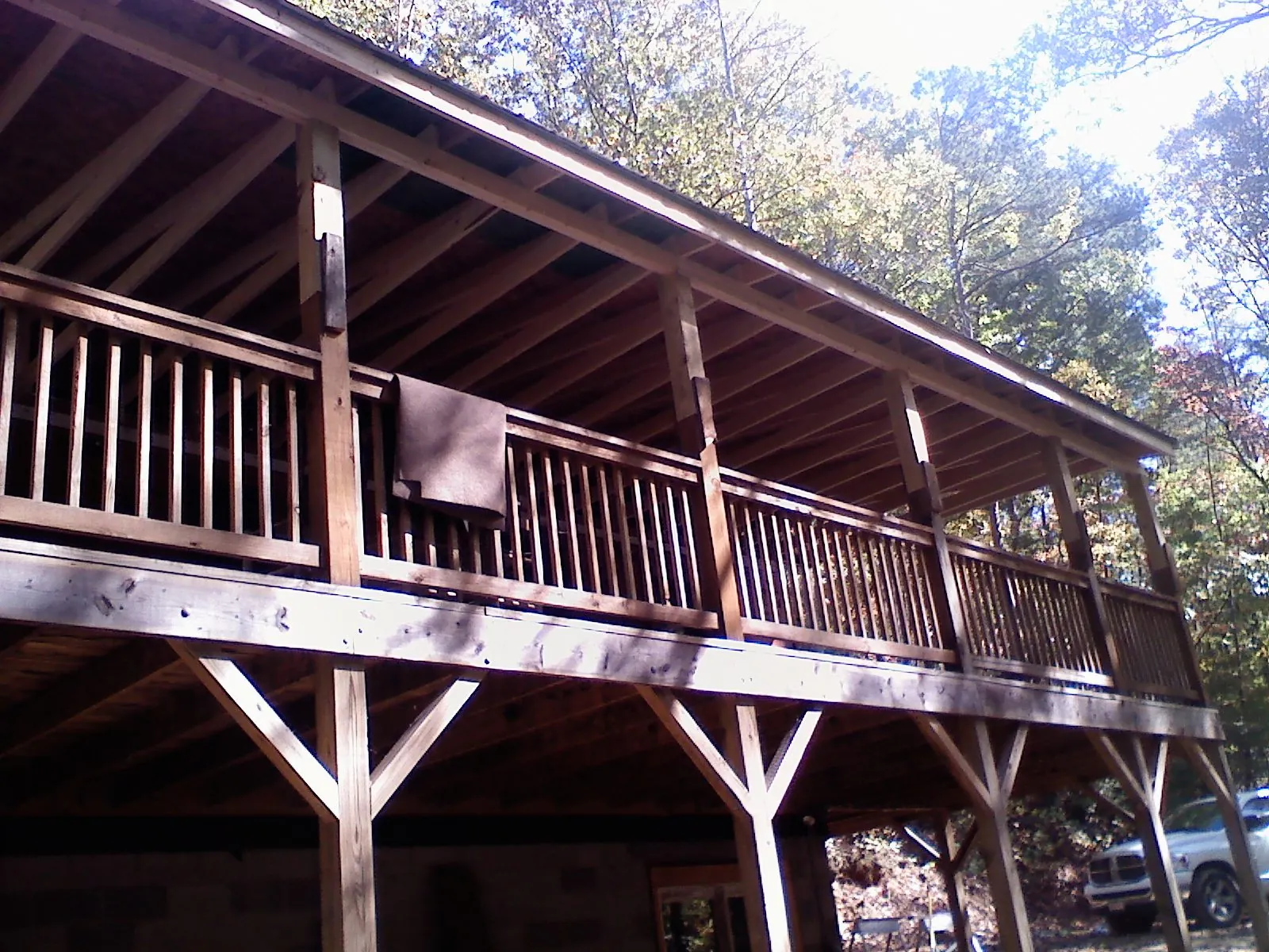 Timber framing under a new elevated porch and deck — Roof Leak Repair in Oliver Springs by Roofing Brothers